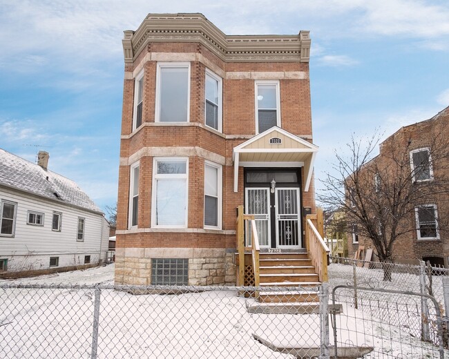 Building Photo - 7322 S Langley Ave Unit 2