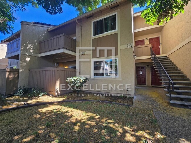Building Photo - 2/2 Downstairs Condo with Patio, Washer an...
