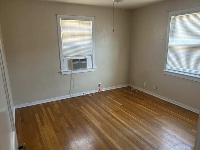 Window unit and ceiling fan in bedroom - 208 Circular Rd Unit 4