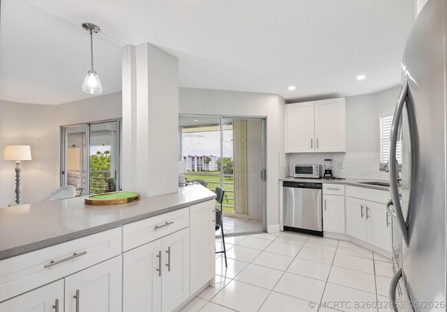 Building Photo - 3661 Via Poinciana Unit 616