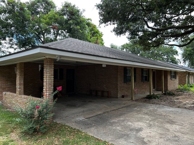 Building Photo - 3 Bedroom, 2 Bathroom, Brick home, Carport...