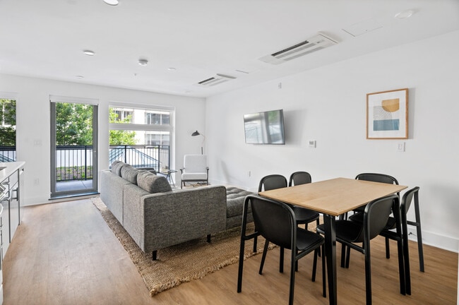 Building Photo - District (Furnished Rooms) Rental