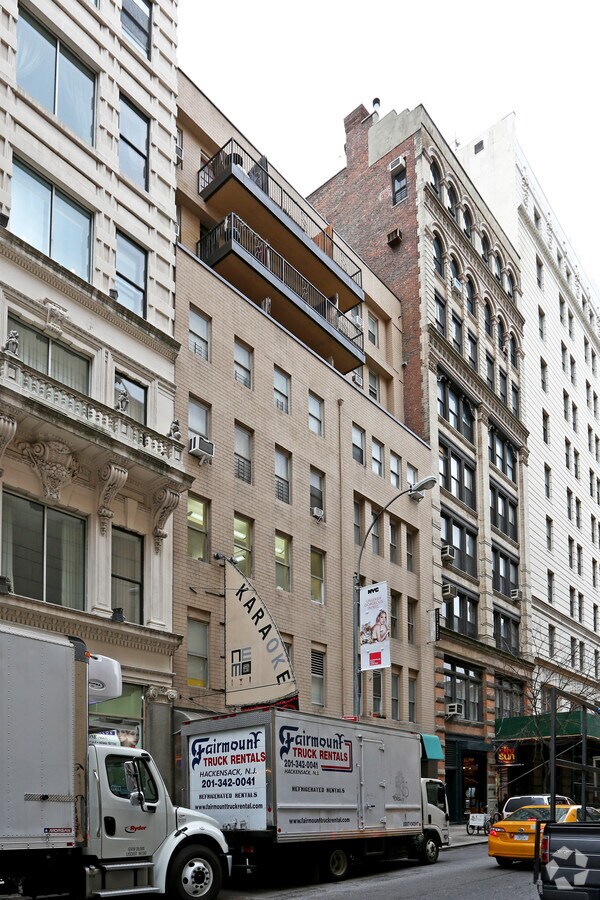 Photo - 52-54 E 13th St