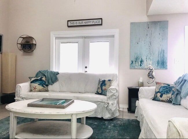 Large family living room with 3 couches and Roku tv - 930 Gulf Shore Dr Unit #23