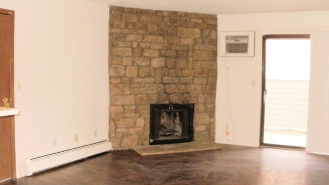 Living Area w/Wood Burning Fireplace - 10150 E Virginia Ave Unit 14-107