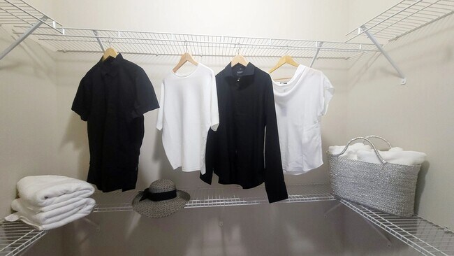 Revel in ample closet space with custom-built organizers for maximizing storage, including select homes with generous walk-in closets.