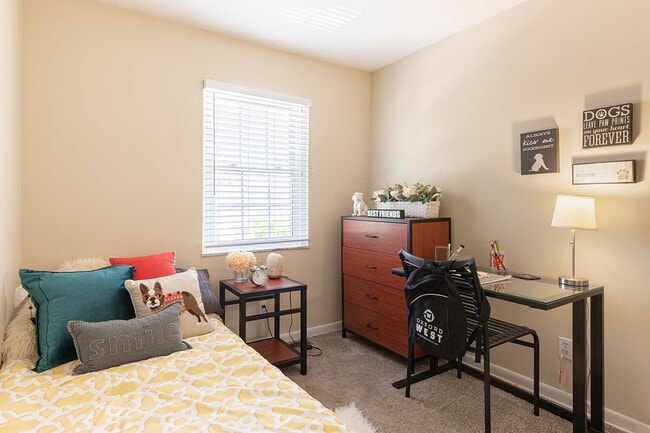 Experience the comfort and charm of this inviting bedroom, perfect for relaxation and study. - Oxford West