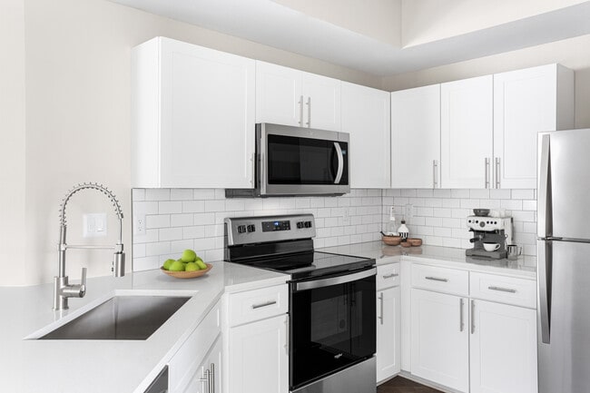 Cook, dine, and gather in a stylish kitchen space.