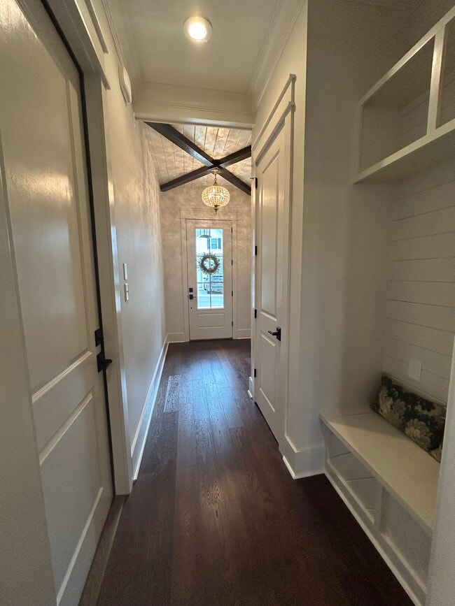 Foyer: coat closet and built-in bench seating - 308 Dahlonega Dr Unit 21 Camellia Oaks