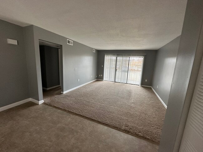 Living Room with glass doors leading to patio