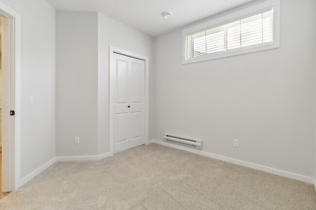 Photo - 21003-21025 25 Ave NW