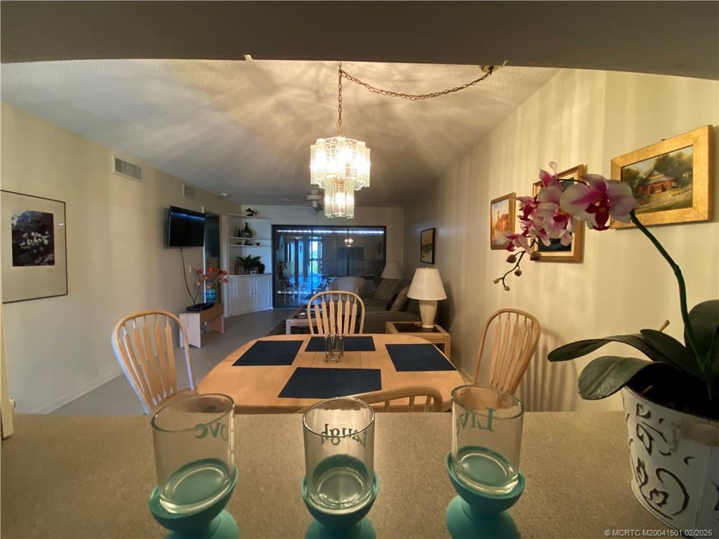 Photo - 4620 NE Sandpebble Trce Condo Unit 405