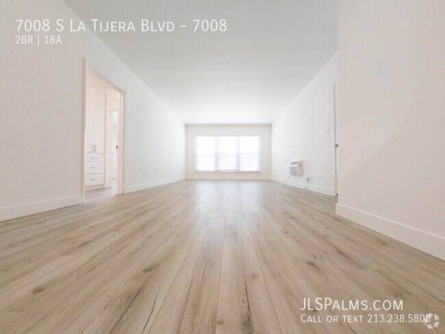 Building Photo - Beautifully remodeled 2 bed w/Full stainle... Unit 7008 Rental