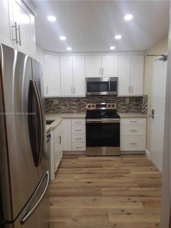 Building Photo - 10777 W Sample Rd Unit 1119