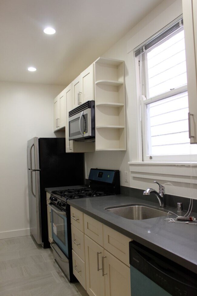 Photo - 2BR. Private Patio! Parking! DISHWASHER! On-Site LAUNDRY! HARDWOOD! Unit #1
