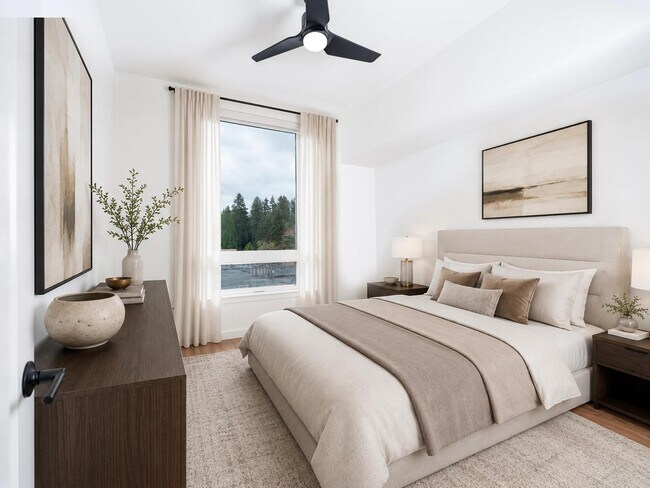 Primary bedroom with soft natural light, tailored finishes, and a calm layout designed for rest and a comfortable daily rhythm.
