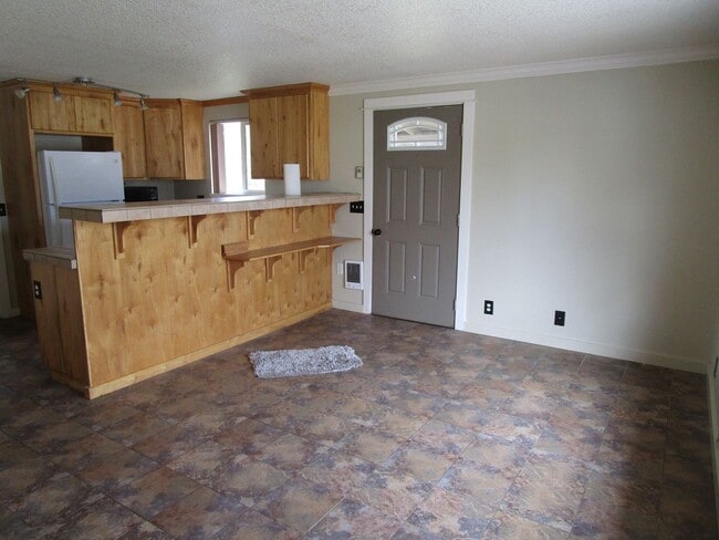 Photo - 1 Bedroom Unit with Gate Privacy - All Utilities Provided, Including Yard Care and Internet!