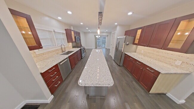 "Stunning 4-Bedroom Birmingham Home with 5 Full Baths, Granite Elegance, and a Finished Basement!"