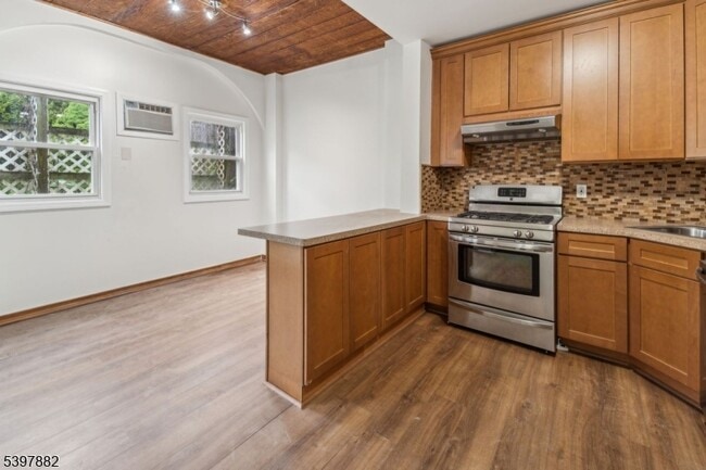 Building Photo - 310 Paterson Plank Rd Unit 1R