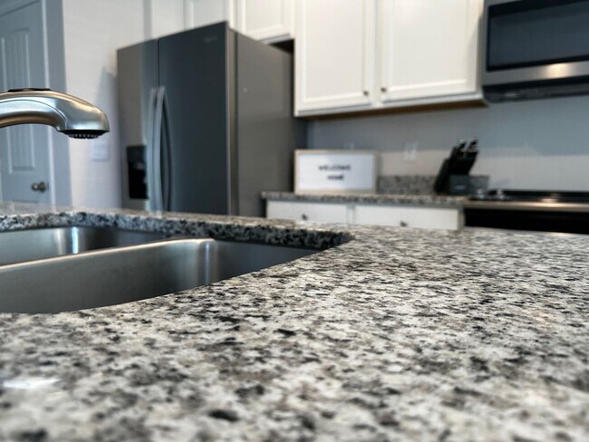 Photo - Resort Style Living! Stunning 3/2.5 Townhome in Waterleigh! Available April!