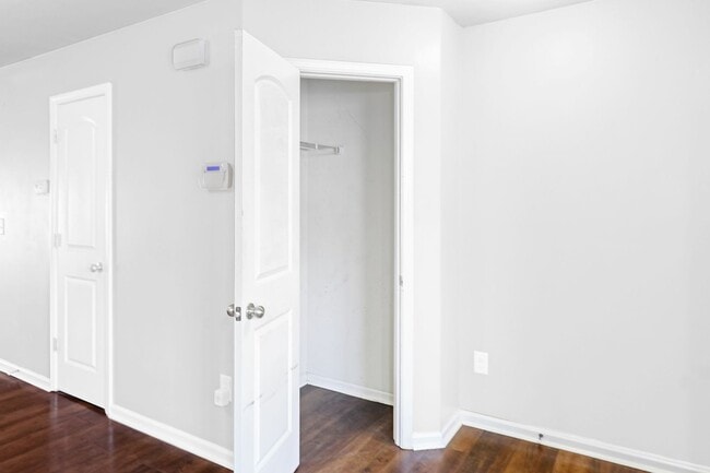 Photo - pdated 2BR/2.5BA Townhome with Private Fenced Patio