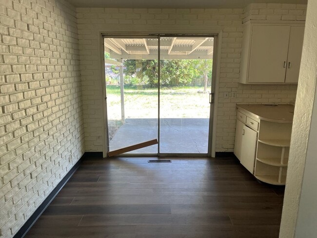 Photo - New flooring, New Paint. Garage & Carport
