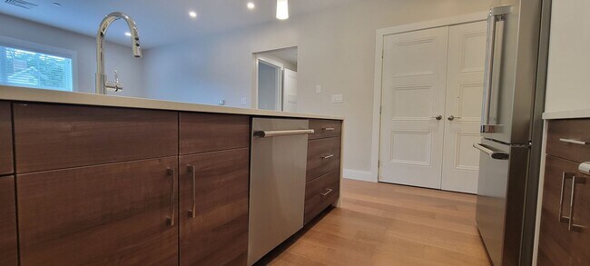 Photo - Large 2bd/2bath with Garage parking! Steps to Commuter Rail!
