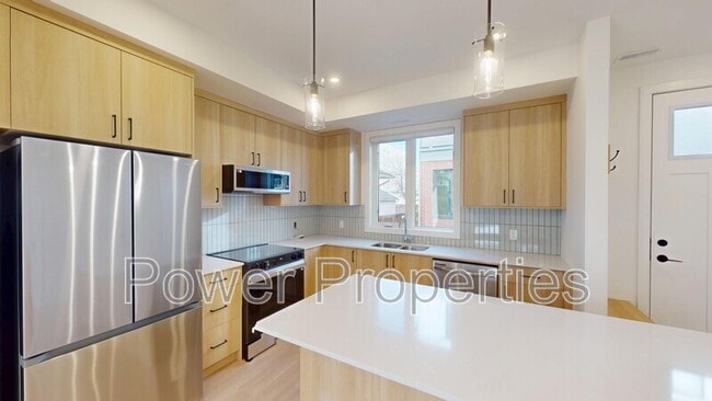 Photo - 1336-210 10 Ave SE