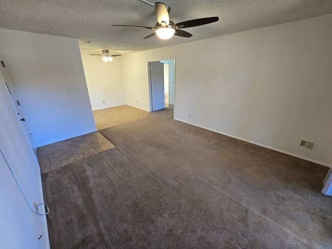 Photo - Move-In Special: 1/2 off 1st Month's Rent!!! Freshly Painted 1-Bedroom Condo with Covered Parking Unit 93