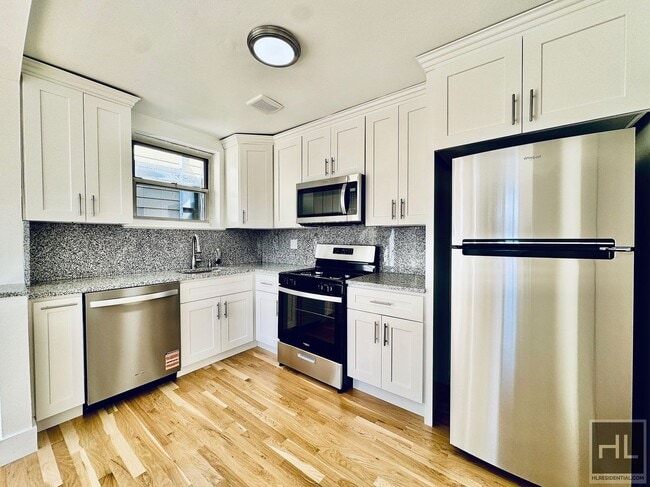 Photo - Newly Renovated 2 bedroom apartment spanni... Unit 2