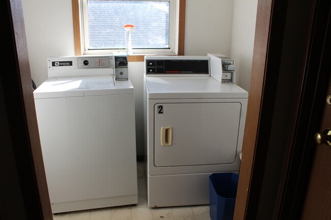Coin-operated laundry in building - 1008 Elmwood Ave