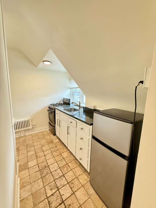 Photo - Unique Top floor Studio Apartment in Eclectic Capitol Hill House! Available Now! Unit 9