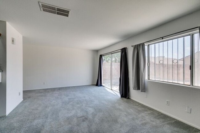 Photo - Double Primary Townhome with Spacious Backyard in 89115!