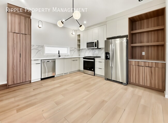 Photo - Modern 3 Beds, 2.5 Baths Main Floor/ Upper | No Pets Allowed