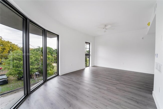 Building Photo - 1165 NW 8th Ave Unit 104