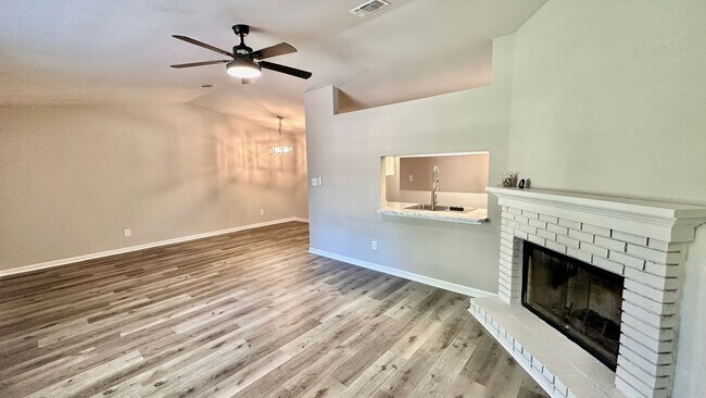 Photo - RENOVATED 2/2 w/ Updated Flooring, Paint, Appliances, & Fixtures! Open Floor Plan & Fenced Yard! ...