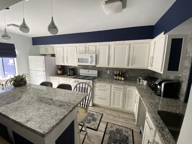 Kitchen with Granite counters and new cabinets - 4 Staunton Ct Unit C