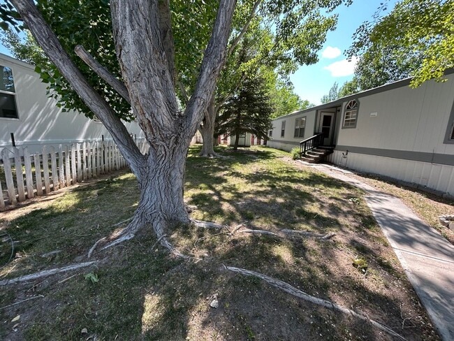 Photo - 3 Bed 2 Bath Mobile Home with Fenced Yard and Storage Shed