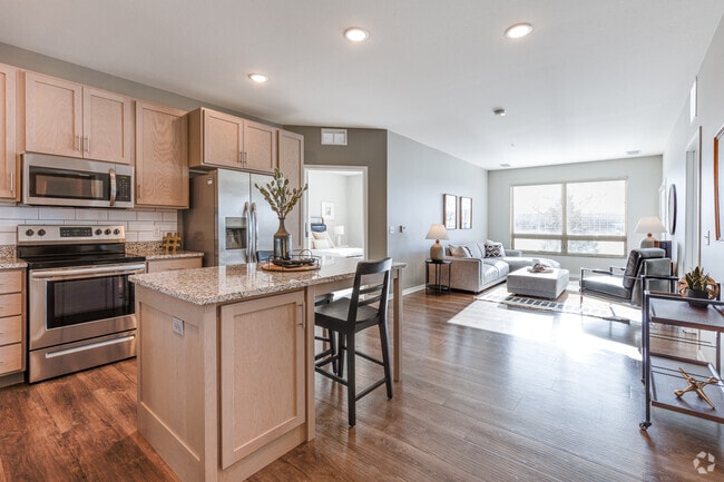 2BR, 2BA - 1119SF - Kitchen and Living Room