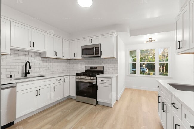 Photo - Newly REMODELED large 4 bed / 4 bath home w/ family room, private bonus room / home office, and "...