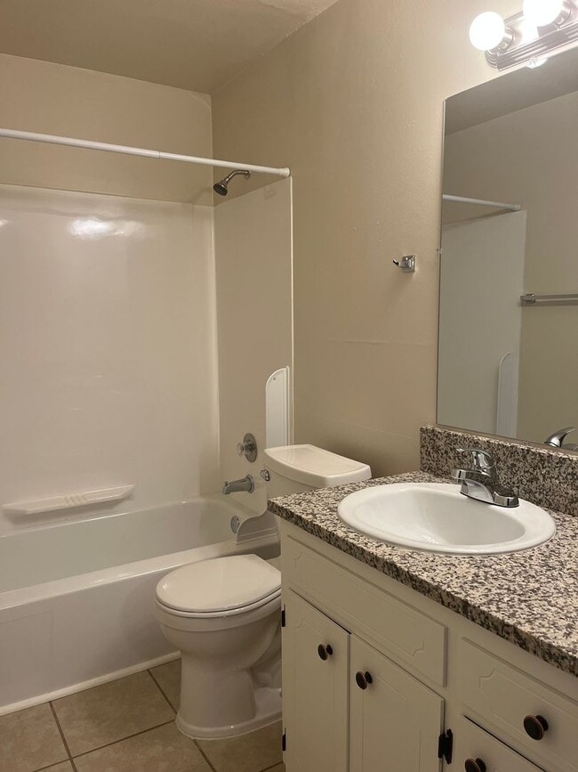 Photo - 1 Bed • 1 Bath Downstairs Unit - Updated Flooring Unit 3434-57