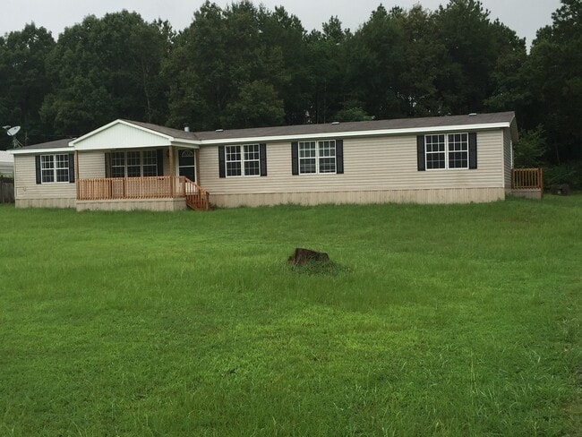 Building Photo - Spacious 4-Bedroom Home on 1 Acre – Peacef...