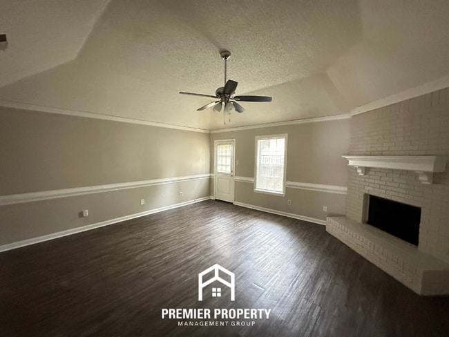 Photo - Charming 3BR/2BA Near Southwind | Vaulted Ceilings, Hardwood Floors & 2-Car Garage