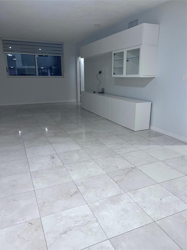 Building Photo - 5091 NW 7th St Unit 115