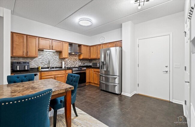 Photo - 3501 Wellington Ct Unit 203