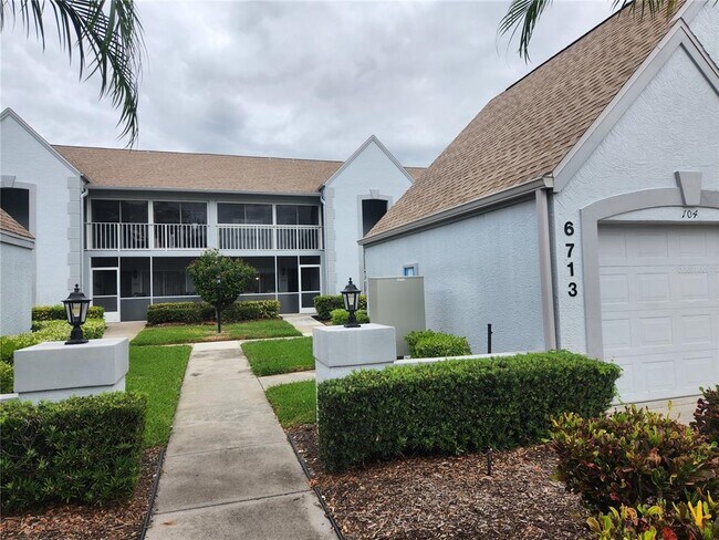 Building Photo - 6713 Stone River Rd Unit 104