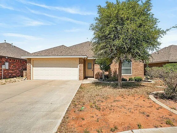 Photo - Comfy 4-Bed Midland Home with all appliances, backyard, attached garage, 6 min to grocery store