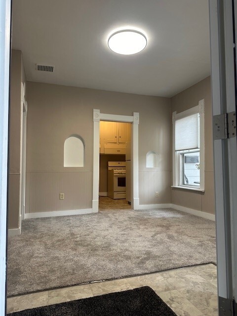 a view from the entryway of the home - 122 8th St E Apartments Unit 122.5