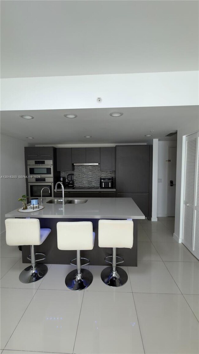 Building Photo - 7661 NW 107th Ave Unit 206