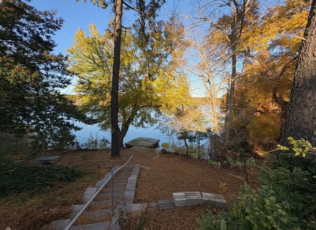 Photo - Lakefront 3-Bedroom Home with Dock & Stunn...